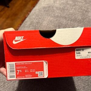 Nike Black and White Slip on Shoes